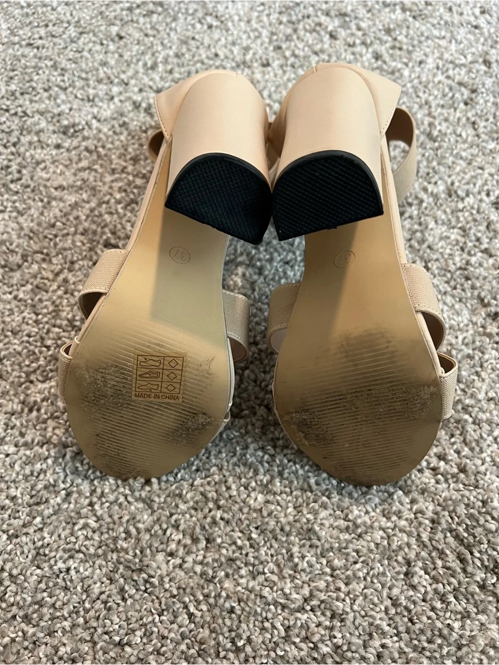 Women’s beige chunky high-heel sandals with a crisscross front. Size 6.5.